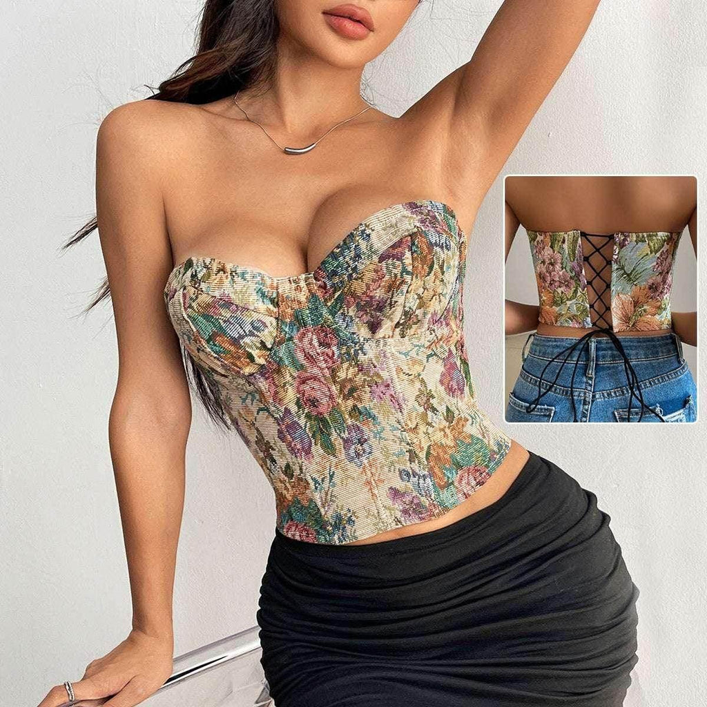 Woman wearing floral bustier corset top with sweetheart neckline and lace-up back detail.