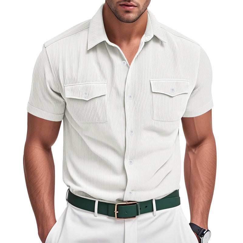 Man wearing a white short-sleeve shirt with a green belt on a white background