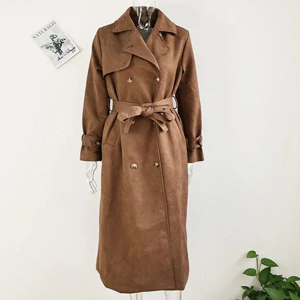 Women's brown double-breasted trench coat with belt, displayed on mannequin