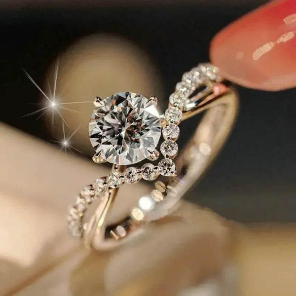 Elegant gold ring with sparkling round diamond and pavé band, women’s jewelry closeup