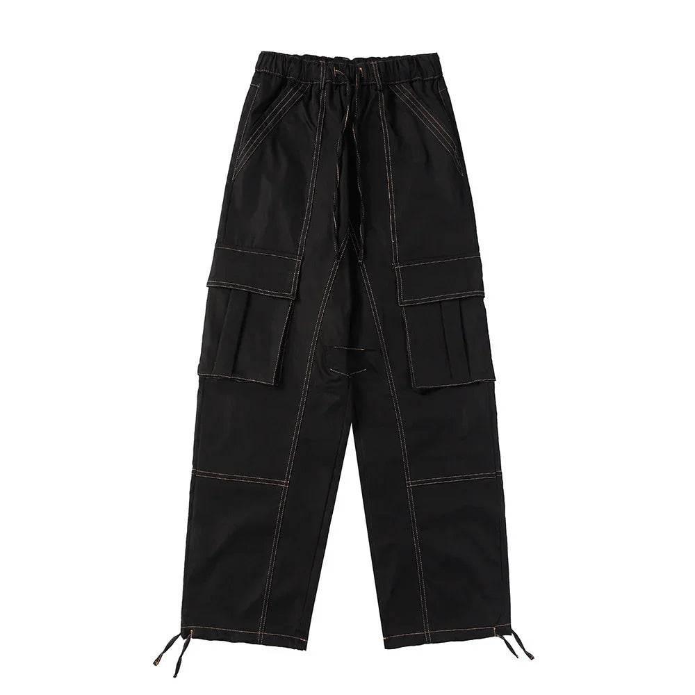 Black cargo pants with multiple large pockets and drawstring waist, streetwear fashion