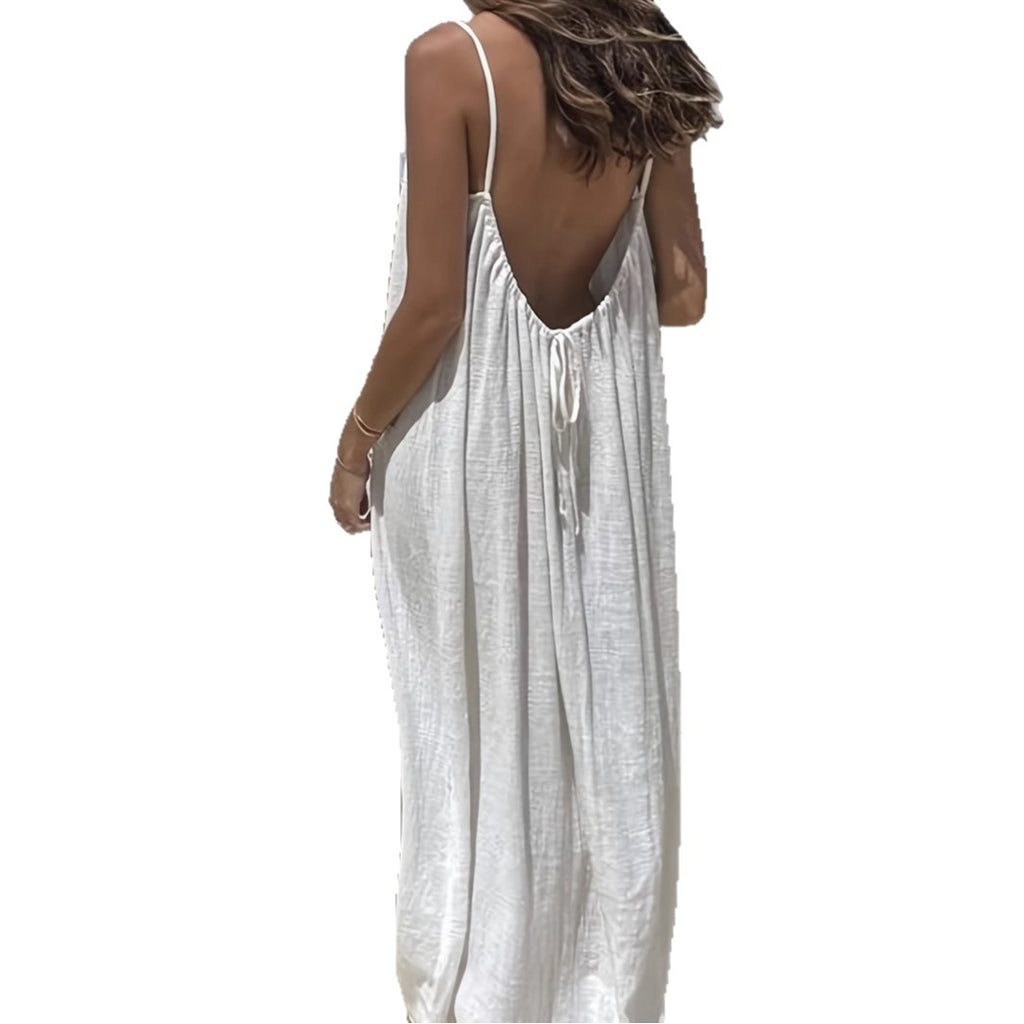 White sleeveless dress with thin straps on a white background