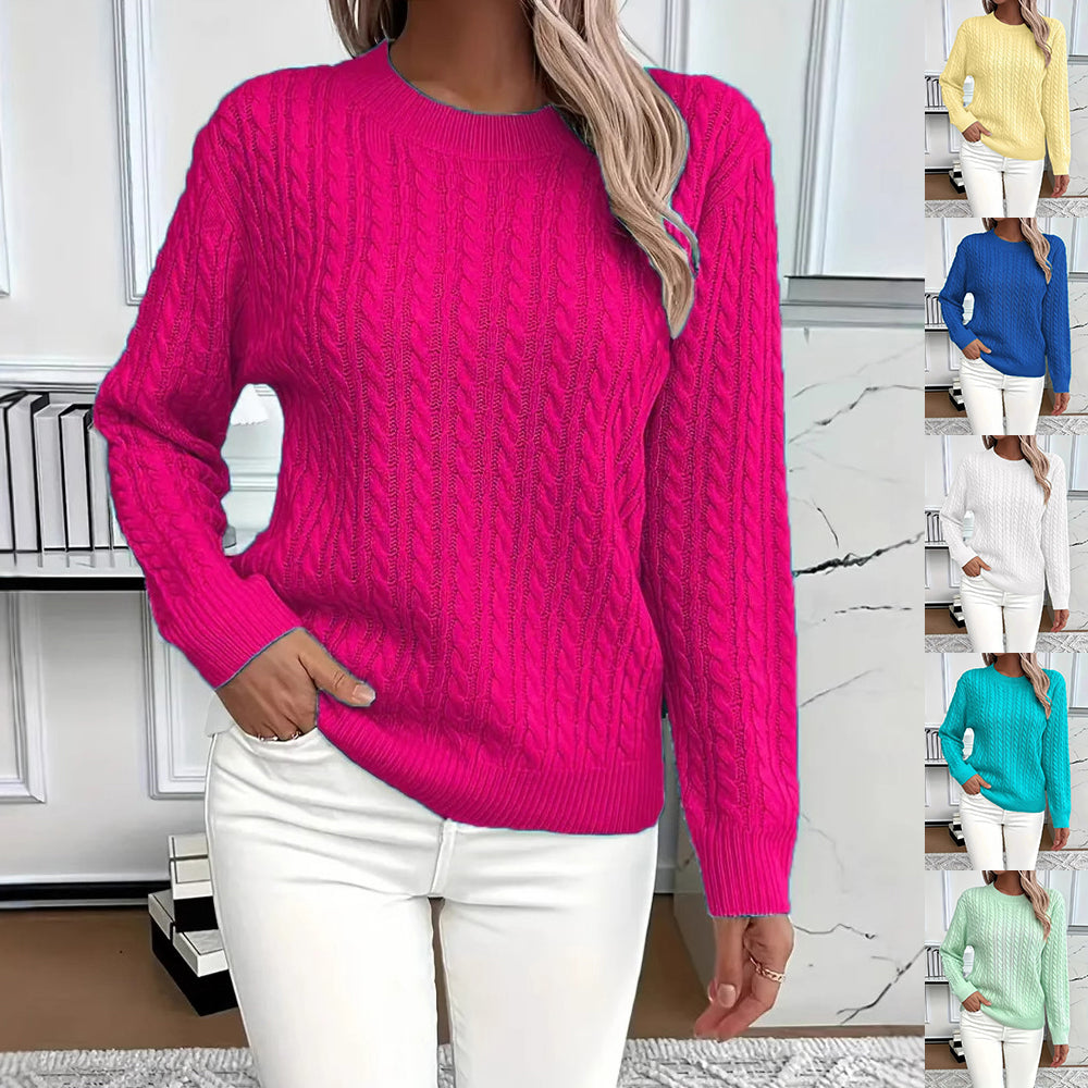Person wearing a bright pink sweater with a neutral background