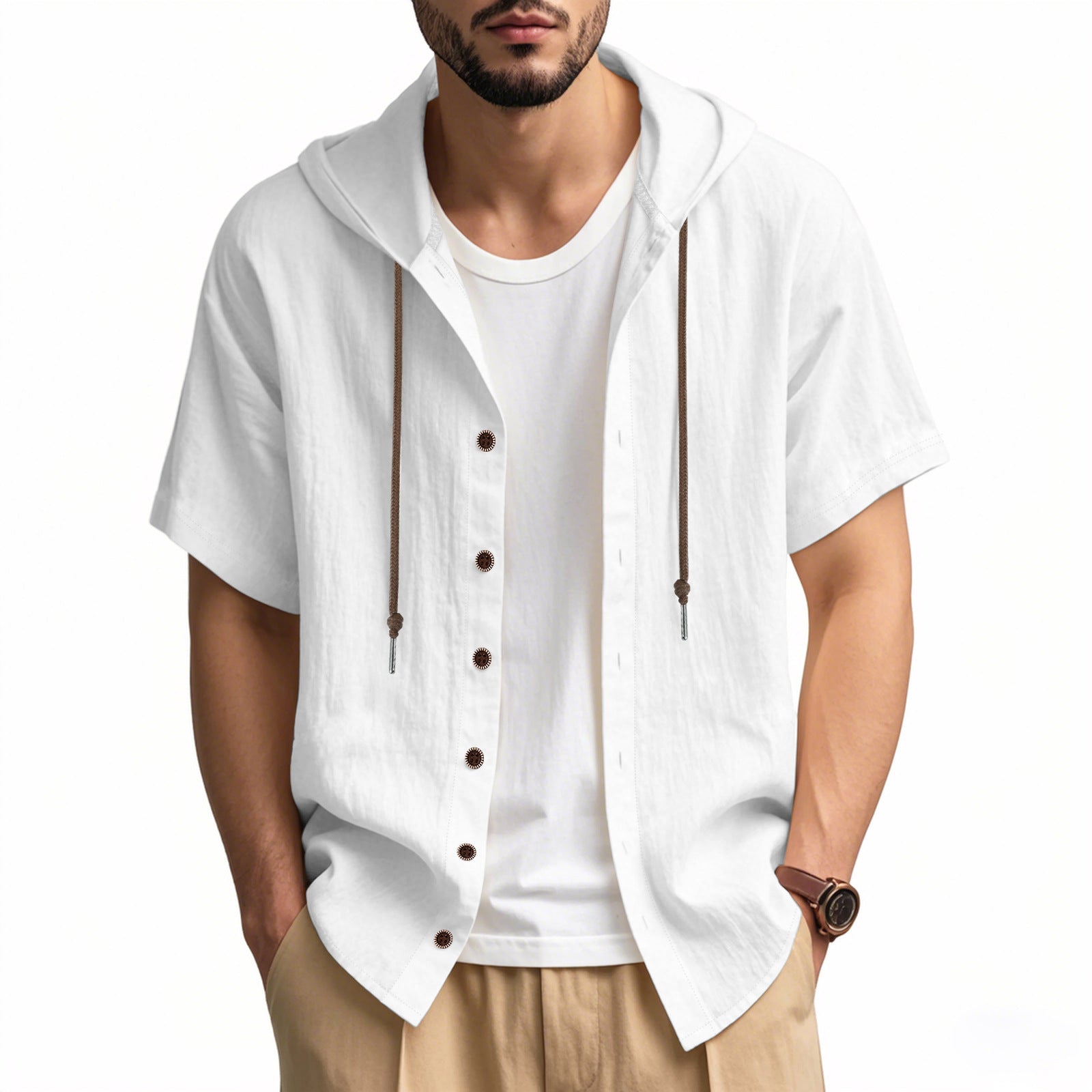 Man wearing a white short-sleeve button-up shirt over a white t-shirt on a white background
