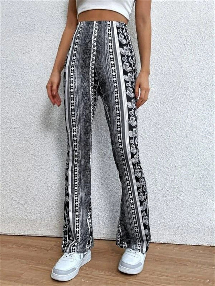 Person wearing patterned pants with a white background