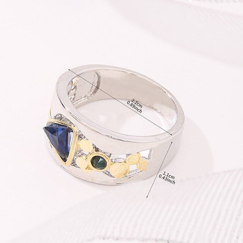 Silver ring with gemstones and measurements on a white background