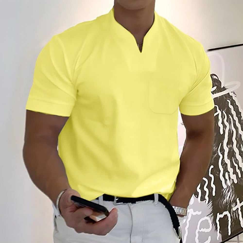 Person wearing a bright yellow shirt with a white background