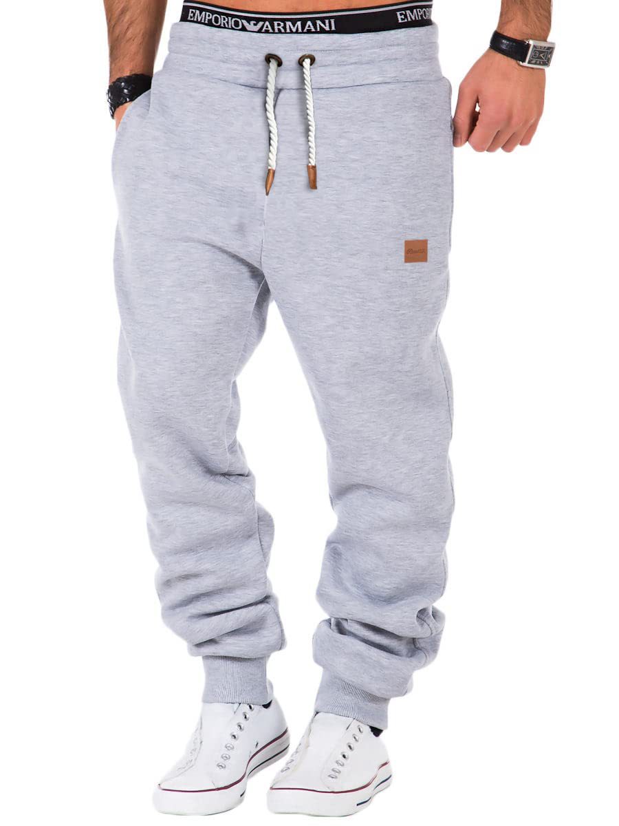 Gray sweatpants with brand logo on a white background