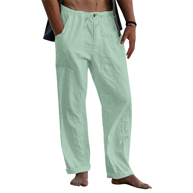 Light green pants worn by a person on a white background