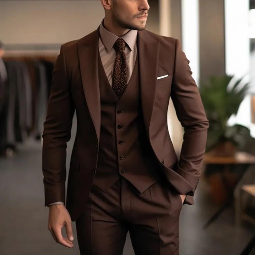 Man wearing a brown suit in an indoor setting