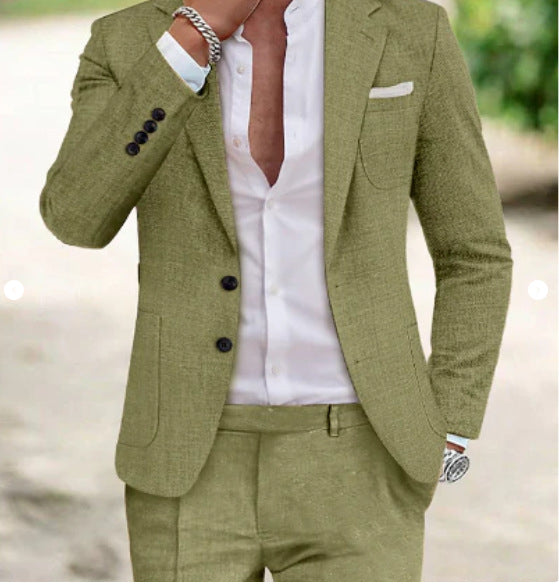 Green suit jacket and pants with a white shirt on a blurred outdoor background