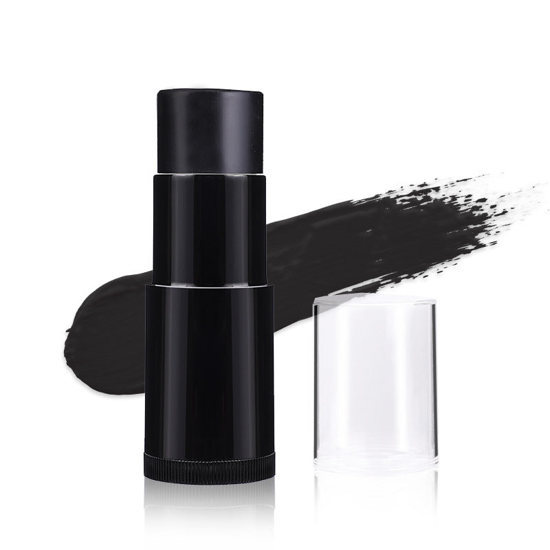 Black makeup stick with a swatch of black color on a white background