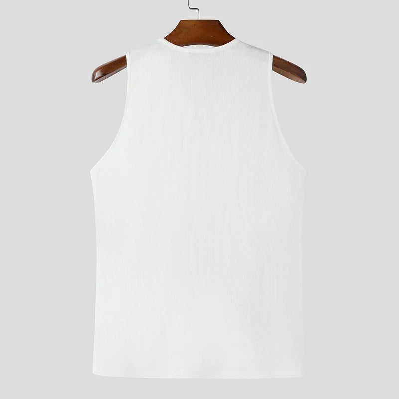 White sleeveless top on a wooden hanger against a light gray background