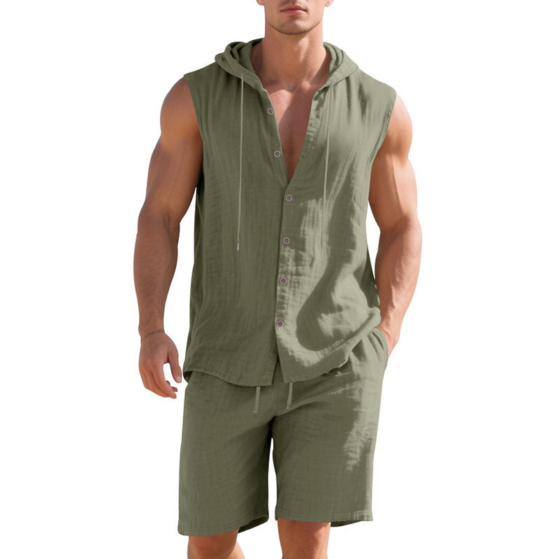 Man wearing a green sleeveless shirt and shorts set on a white background