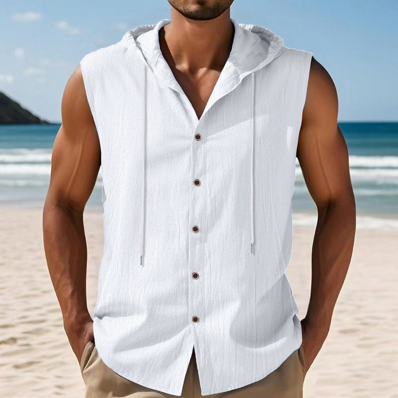 Man wearing a white sleeveless shirt with buttons on a beach