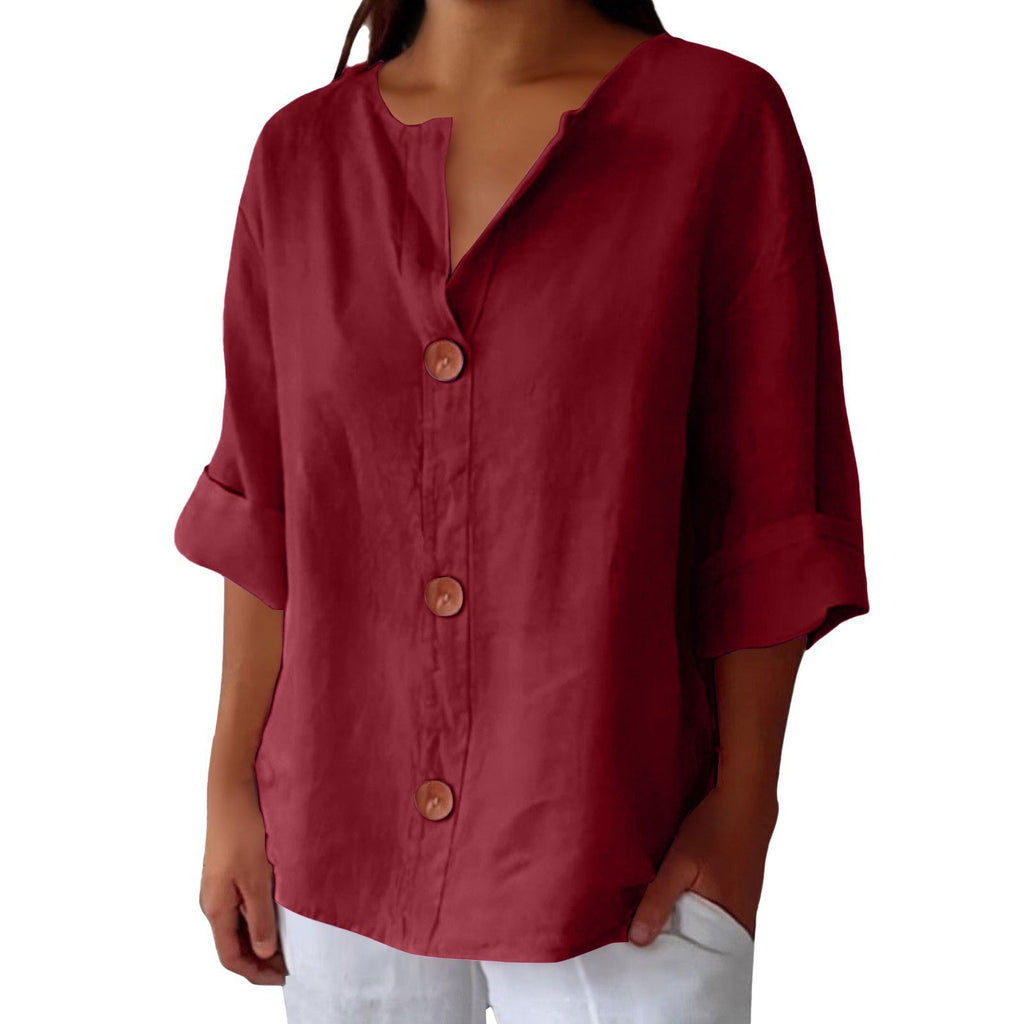 Red button-up shirt worn by a person on a white background
