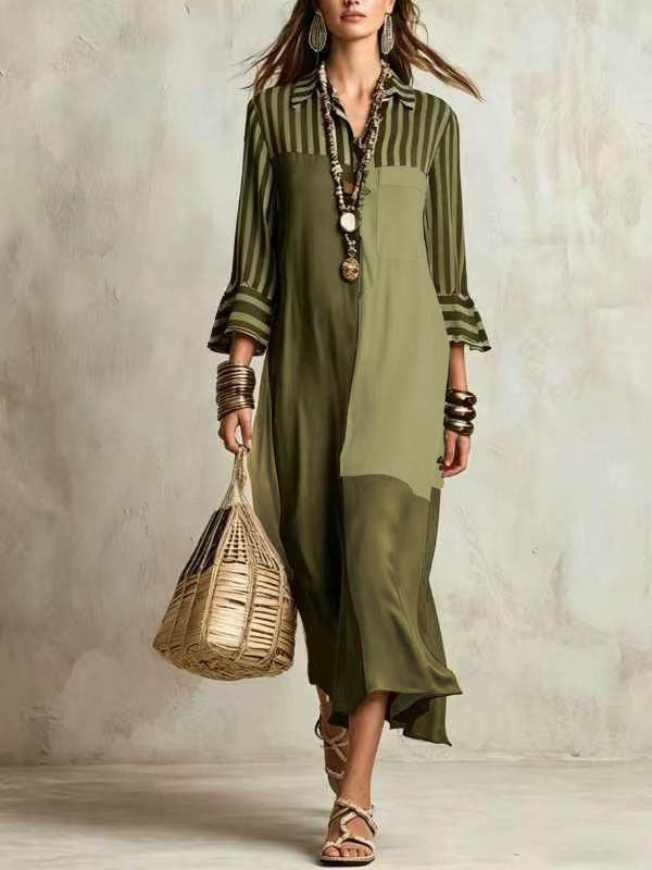 Woman wearing a green dress with striped shirt, holding a woven bag against a neutral background