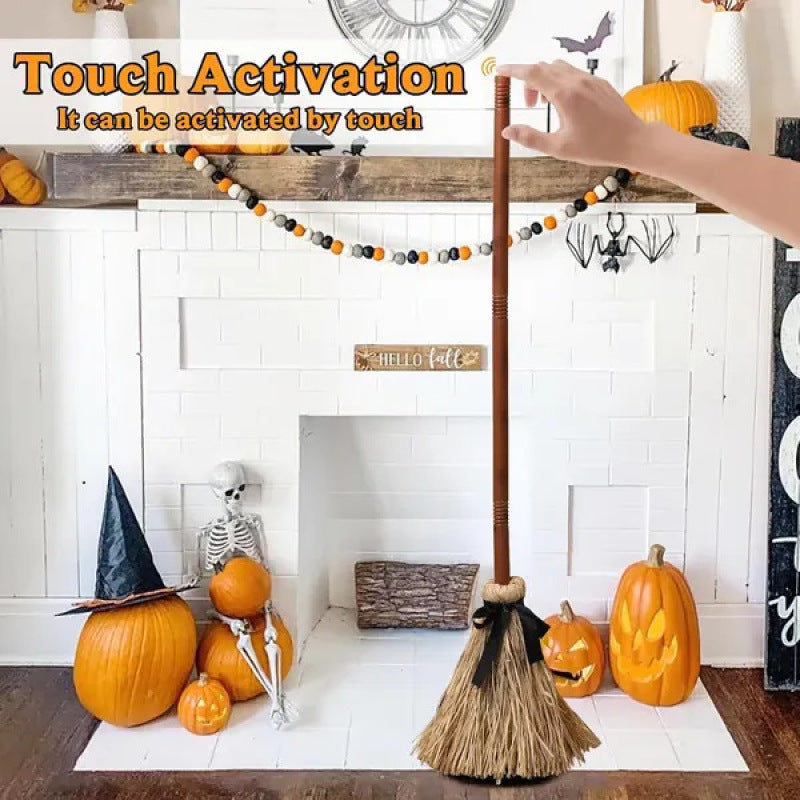 Halloween-themed room with pumpkins, broom, and skeleton, featuring touch activation text.