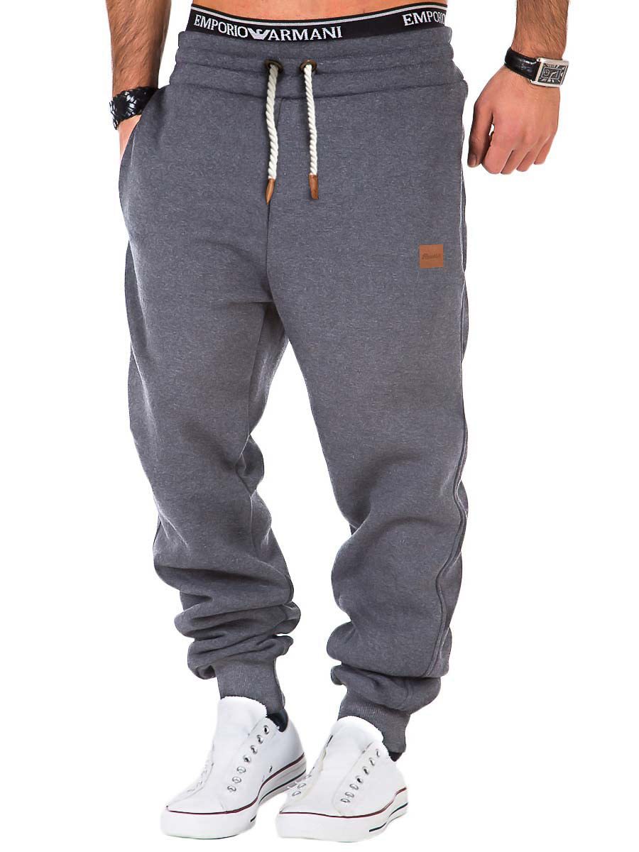 Gray sweatpants with a brand logo on a white background