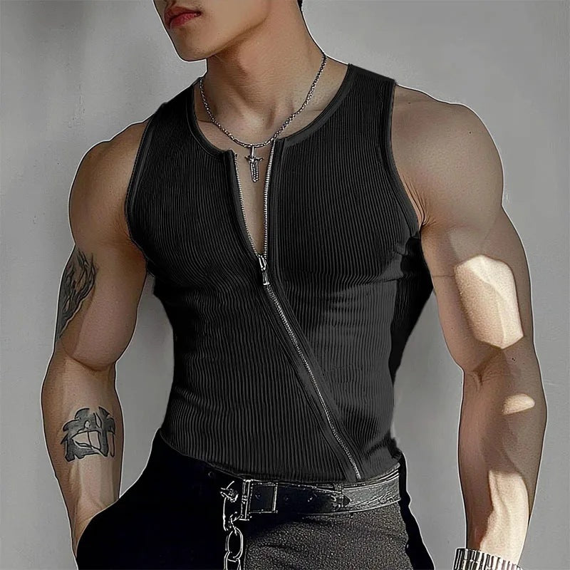 Person wearing a black sleeveless top with a zipper on a gray background