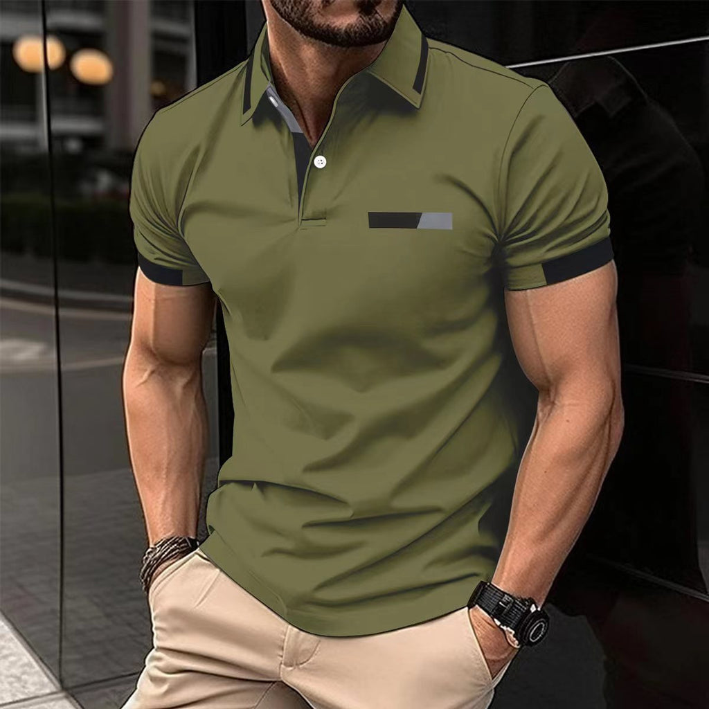 Man wearing a green polo shirt with black accents in an urban setting