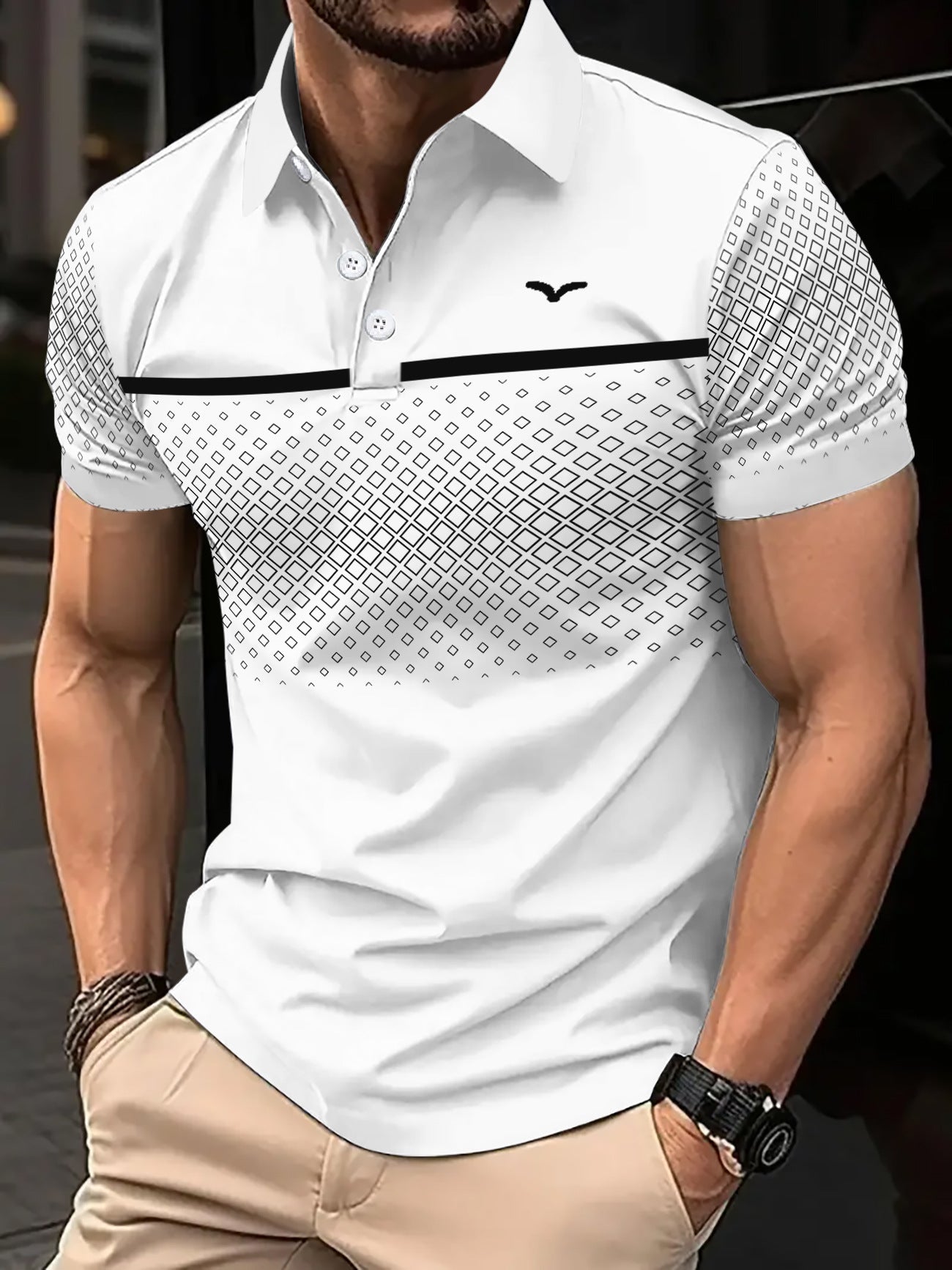 Man wearing a white patterned polo shirt with a blurred background