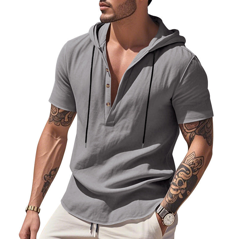 Man wearing a gray short-sleeve hoodie with a white background