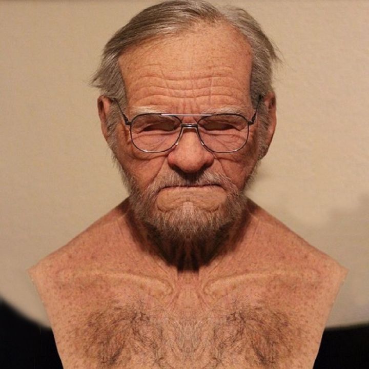 Bust of an elderly man with glasses against a beige background
