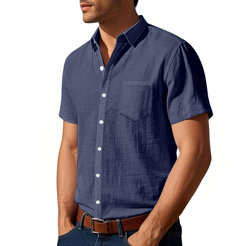 Man wearing a blue short-sleeve shirt on a white background