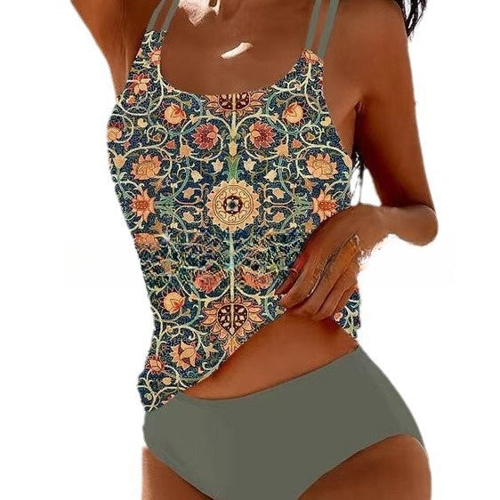 Woman wearing a floral-patterned tankini top and green high-waisted bikini bottom on a white background