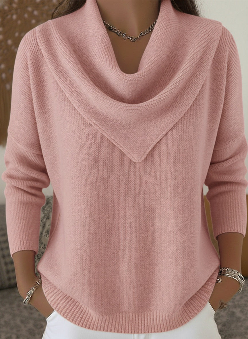 Pink cowl-neck sweater worn by a person with a neutral background