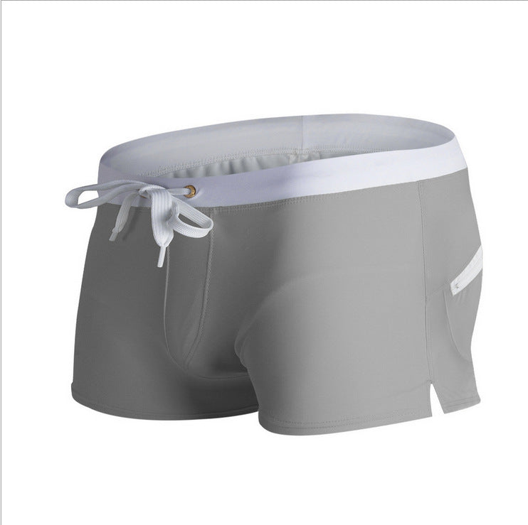 Gray shorts with a white drawstring on a white background