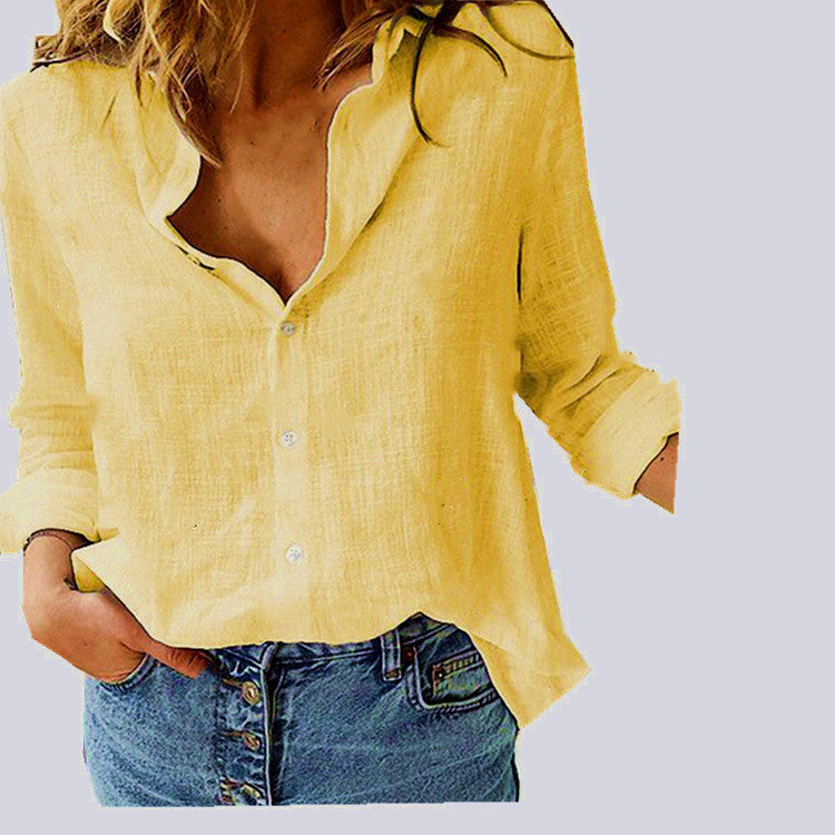 Person wearing a yellow shirt and blue jeans on a light gray background