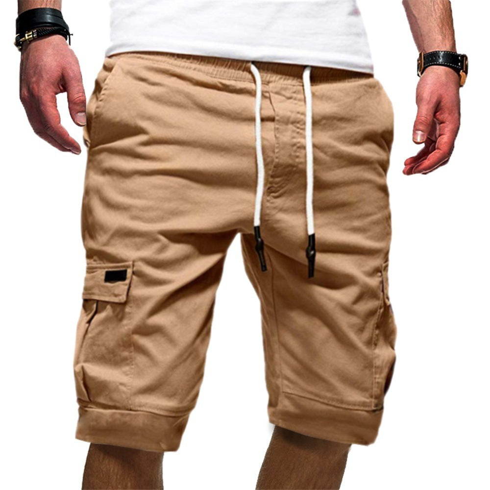Tan cargo shorts with white drawstring on a white background