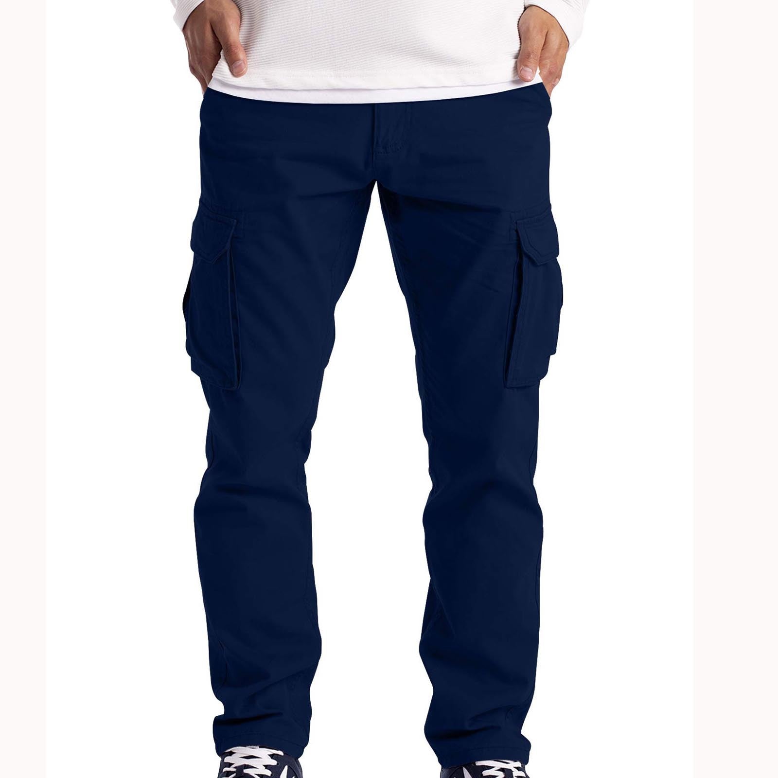 Navy blue cargo pants worn by a person on a white background