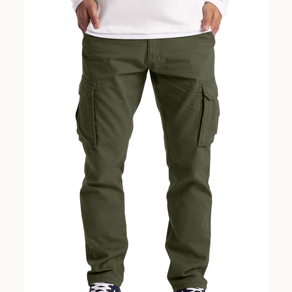 Green cargo pants worn by a person on a white background