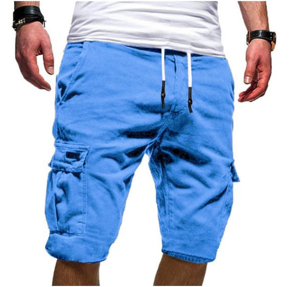 Blue cargo shorts worn by a person on a white background