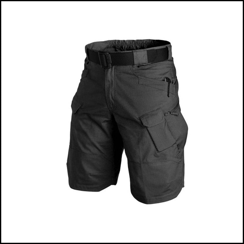 Black tactical shorts with multiple pockets and a belt on a white background