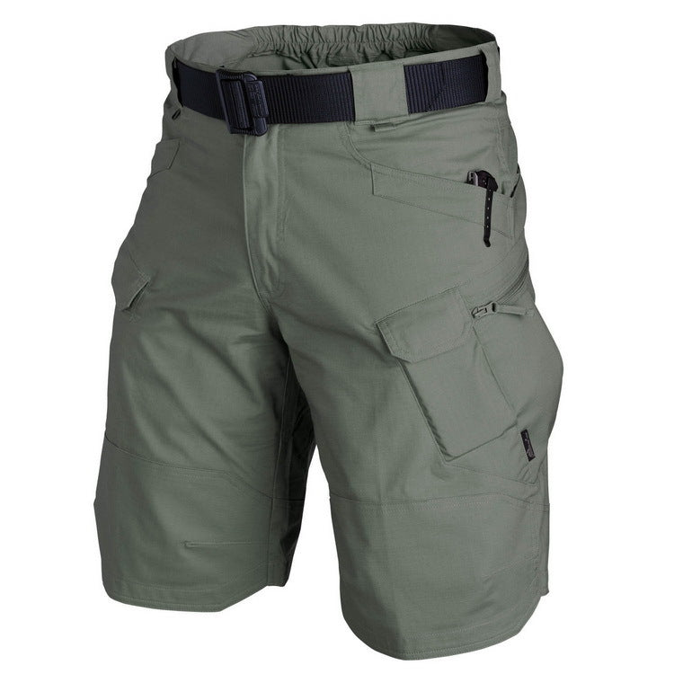 Tan cargo shorts with a black belt on a white background