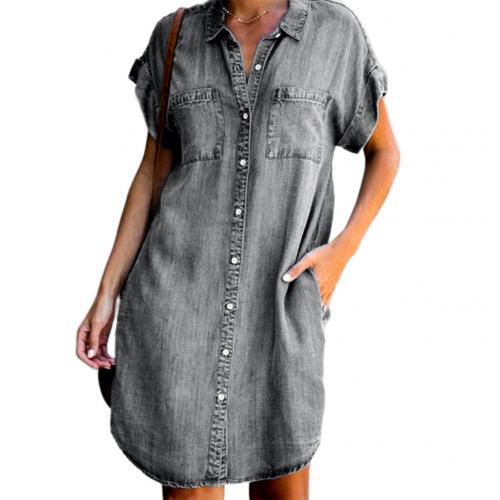 Gray denim dress worn by a person on a white background