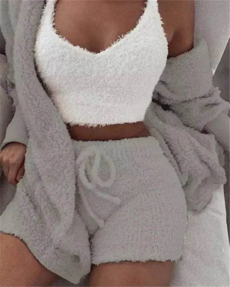 Woman wearing cozy loungewear set with fluffy cardigan, shorts, and crop top from ZA-Zola