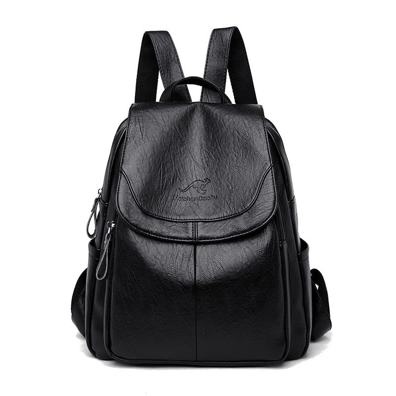 Black backpack on a white background