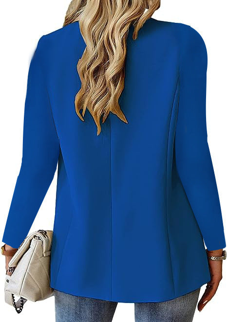 Blue blazer worn by a person on a white background