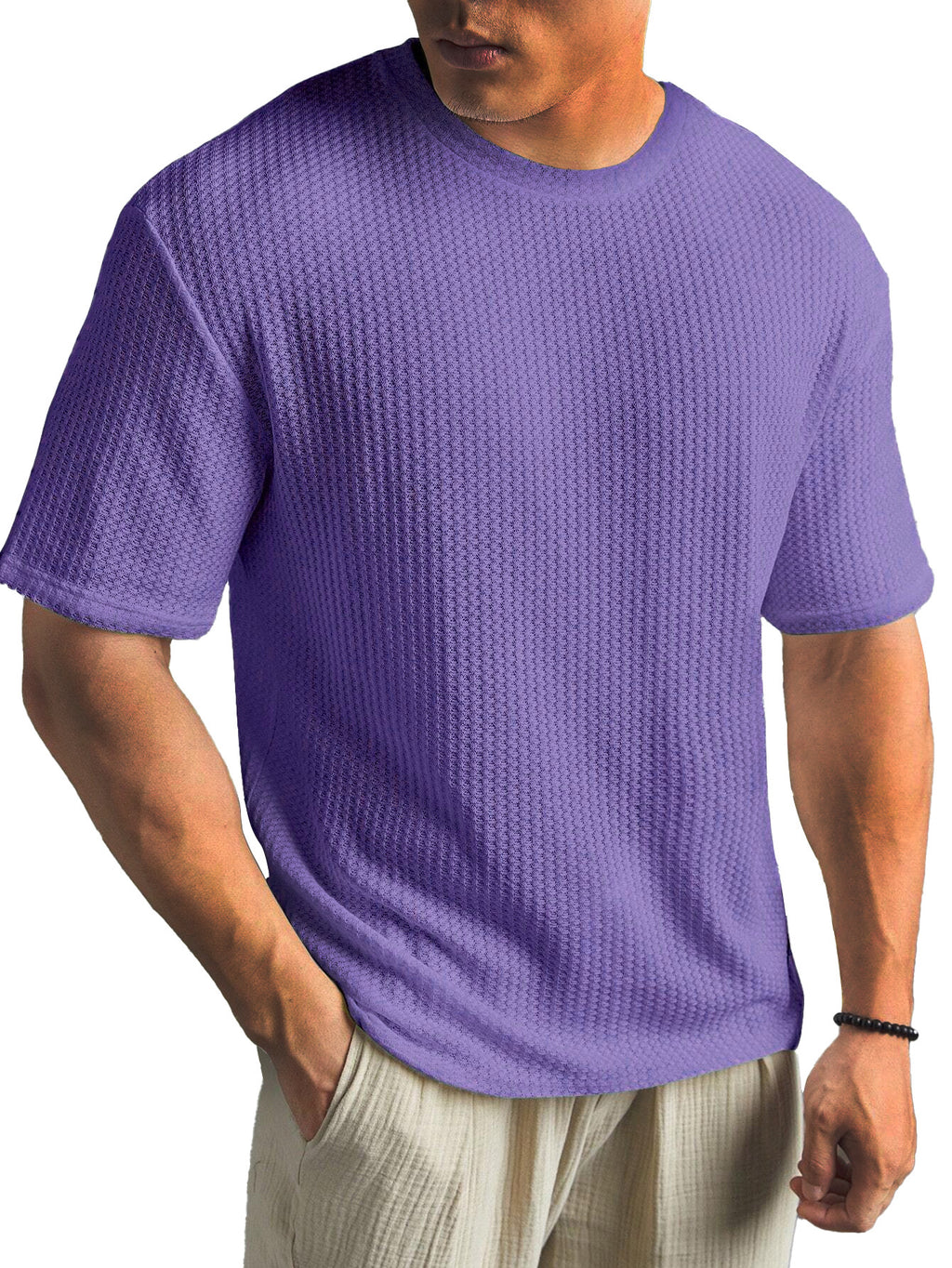 Man wearing a textured purple t-shirt on a white background