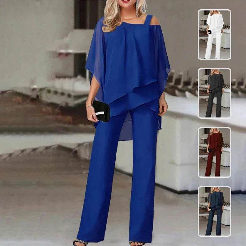 Woman modeling chic blue two-piece pants set with flowy off-shoulder top, ZA-Zola fashion.