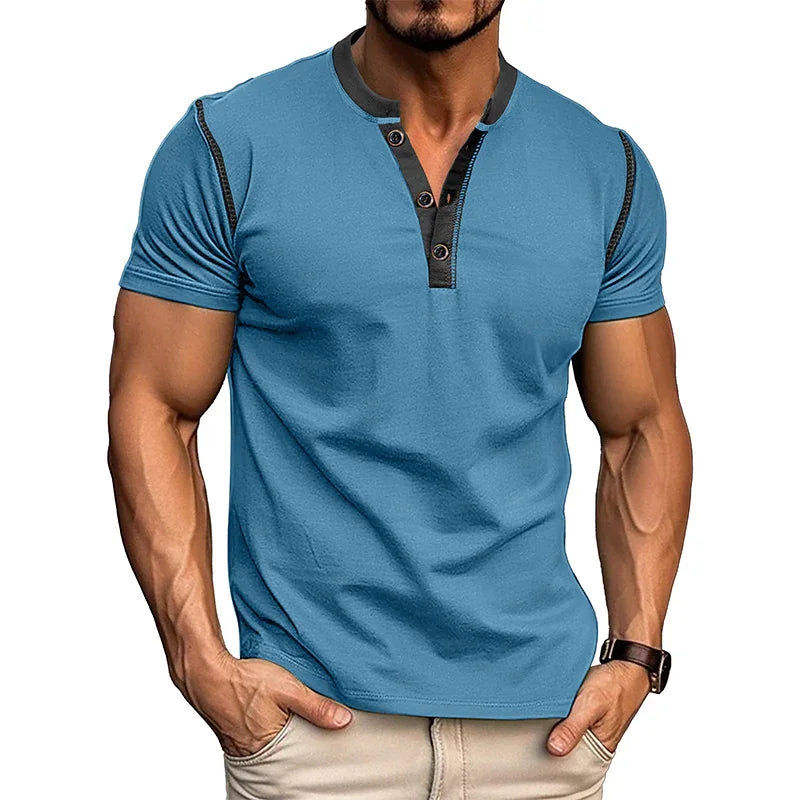 Man wearing a blue short-sleeve shirt with black accents on a white background