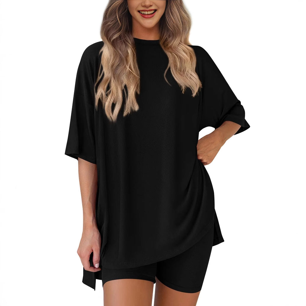 Woman wearing a black dress with a white background