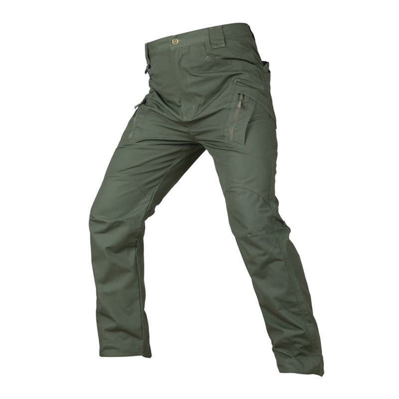 Green tactical pants on a white background
