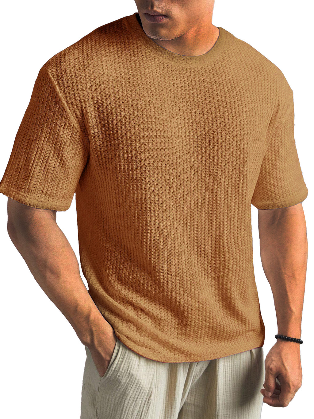 Man wearing a brown textured t-shirt on a white background