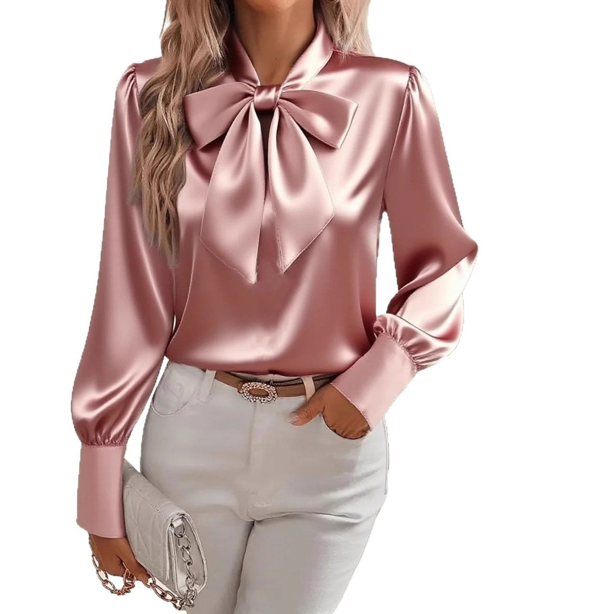 Pink satin blouse with a large bow tie worn by a person on a white background